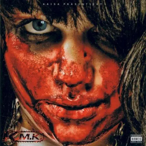 K.M.K.