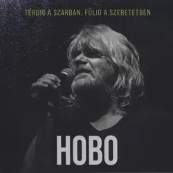 Térdig a szarban, fülig a szeretetben