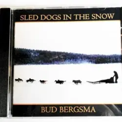 Sled Dogs in the Snow Sled Dogs in the Snow